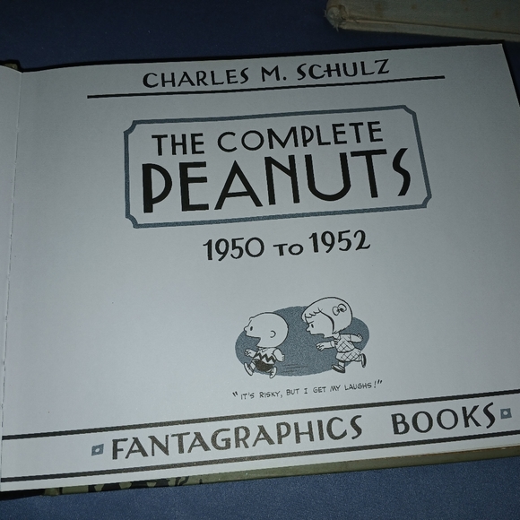 2 peanut glasses and 2 Charlie brown books. - Picture 2 of 6